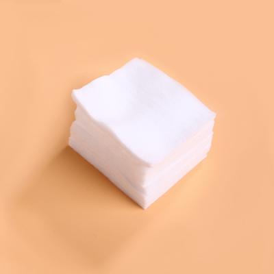 China 5 Layer Cosmetic Cotton Pads 7.5*7.5cm Non Woven Sustainable Compressed for sale