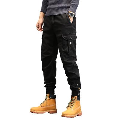 China QUICK DRY Hot Sales Mens Drawstring Pants Multi-pocket Solid Color Cargo Pants for sale