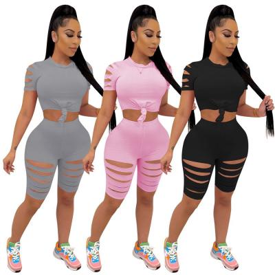 China Wholesale Breathable Summer Shorts Casual Women Two Piece Sets Solid Color Hollow Out Biker Two Piece Short Set for sale