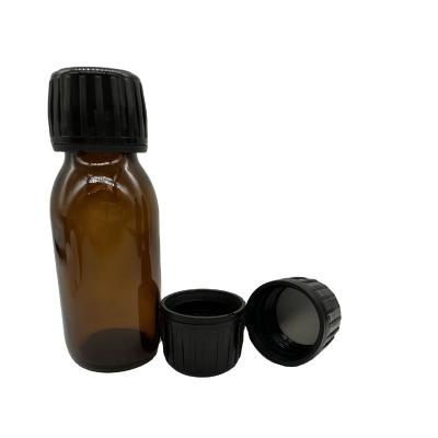 China Pilfer-Proof 28mm Black PilferProof cap plastic screw cap glass syrup bottles seal lid for sale