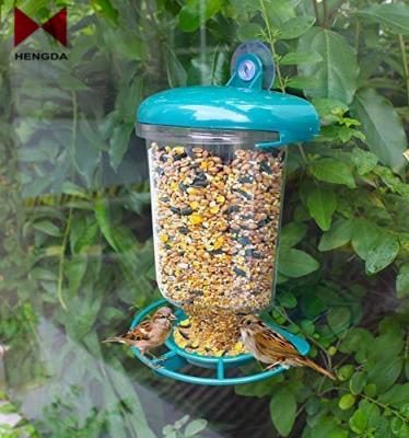 China Clear Automatic Wild Bird Window Seed Nut Peanut Feeder with Hanging Suction Cup and Feed Tray Easy Install All Year Around Bird Feeder for sale