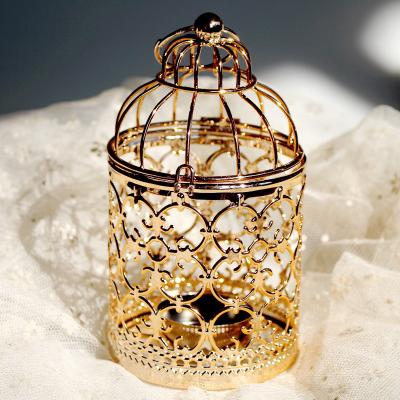 China Home Decor Metal Wire Bird Cagecandlestick Home Furniture Wholesale European Gold Electroplating Wedding Metal Craft Products for sale