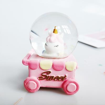 China Europe Girls Gift Snowball Water Globe 45mm Mini Snow Globes Favorite Glass Unicorn Snowglobe for sale