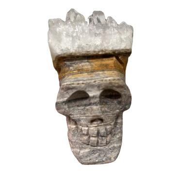 China 100% China Natural Clear Quartz Crystal Skulls With Group Hand Carved Gemstone Skulls for sale