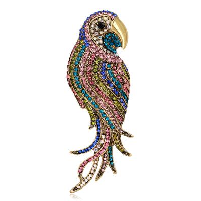 China Luxury Hot Selling Colorful Crystal Rhinestone Animal Parrot Brooch Dressing Accessories Pins for sale