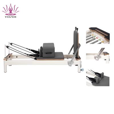 China 2022 Newest Durable Alloy Reformer White Pilates Equipment With Half Aluminum Reformer for sale