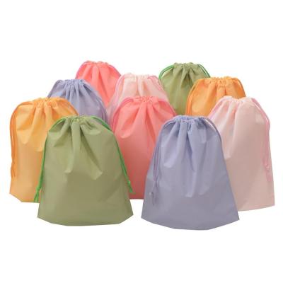 China Small Rope Handle Sizes String Bag Made Non Woven Drawstring Storage Bag Organizer Pouch Packing Bags Cheap Prices Many Colors for sale