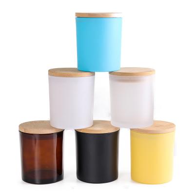 China Unique Empty Home Decoration Luxury Home Decor Glass Candle Jars Containers With Metal Wood Lid for sale