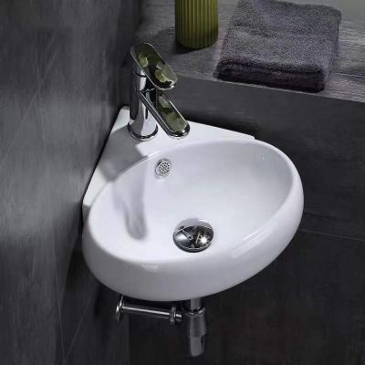 China Eco-friendly Premium Wall Mounted Ceramic Wash Basin Basin Sink Modern Style Bathroom Sink With Faucet for sale