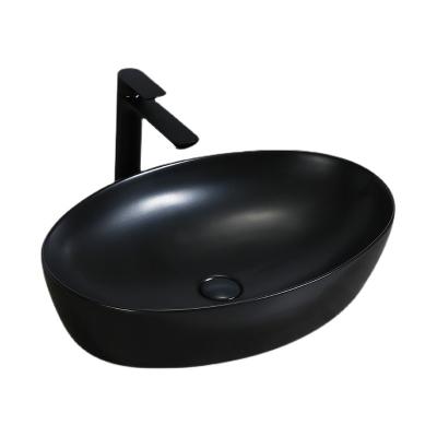 China Eco-friendly Bathroom Multiple Sink Color Matt Black Oval Top Table Ceramic Wash Basin for sale