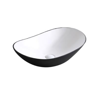 China JINLISI 2022 New Arrival Eco-friendly Bathroom In Wash Hand Black White Oval Countertop No Hole Vessel Sinks Home Washroom Hotel for sale