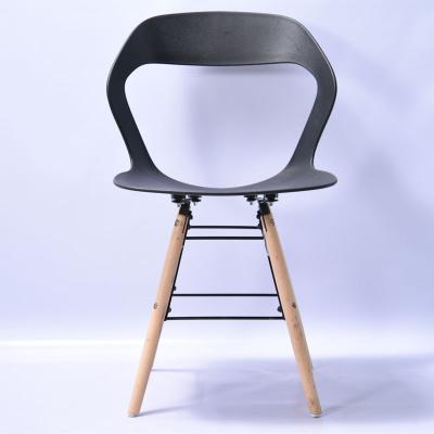 China Modern wholesale Modern Plastic Dining Room Furniture designer Plastic Dining chair with wood legs for sale