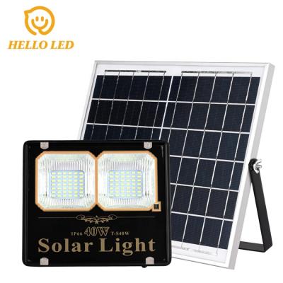 China Optical Control + Controller Super Brightness Remote Outdoor Lighting Solar 40W Daylight Sensor IP65 Reflector Led Light for sale