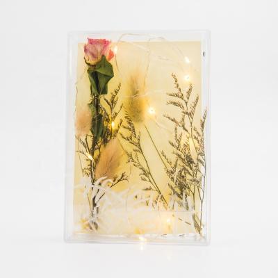 China Bestselling Amazon Valentine's Day Gift Photo Display Dry Sage Flowers Clear Picture Frame with LED Lights for sale