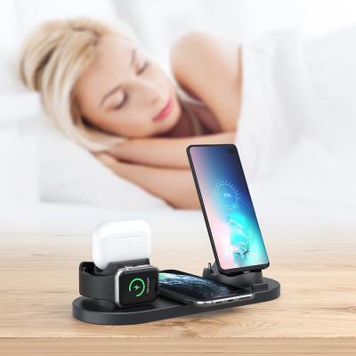 China New High Speed ​​4 in 1 Phone Holder Charging Dock Station 10W Fast Charging Custom Wireless Charger For iPhone for sale