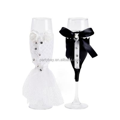 China Modern Bride and Groom Wedding Dress Goblet Champagne Glass Red Wine Glasses Smooth Edge Wedding Wine Glass Set for sale