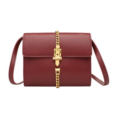 China Simple magnetic ladies bags temperament buckle solid color fashion All-match PU material ladies handbags for sale