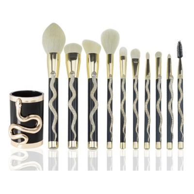 China Angular Blush FYD Vegan Gold Silver Snake Handle Professional Fancy Makeup Brush Set With Holder Cup for sale