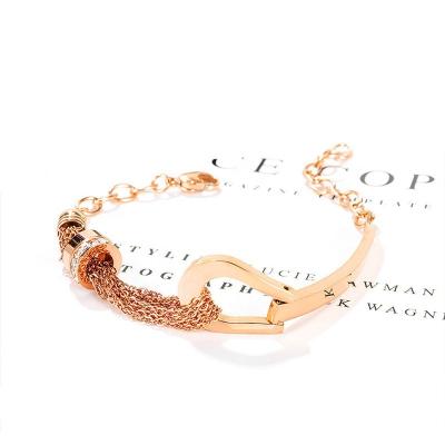 China FASHIONABLE Custom Niche Design Zirconia Rose Gold Diamond Titanium Steel Cylindrical Bracelet for sale