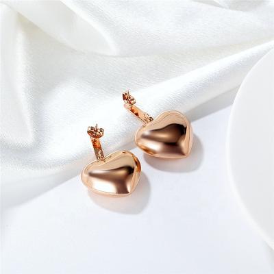 China TRENDY Simple Niche Stainless Steel Rose Heart Gold Earrings For Women for sale