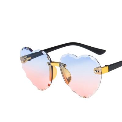 China Fashion sunglasses wholesale fashion boys and girls ocean movie sunglasses cheap kids heart rimless sunglasses for sale