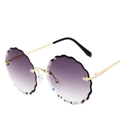 China Fashion Sunglasses Flower Shades Retro Shape Women Frameless Sun Glass Gradient Rimless Sunglasses for sale