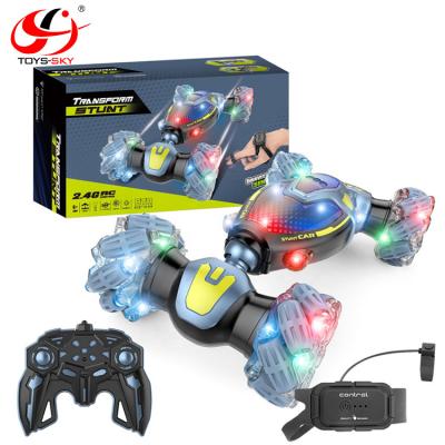 China Remote Control RC Model 2.4G Double Side Drift Twist and Watch Hand Gesture Feeling Control RC Stunt Car Toys with Light and Music for sale