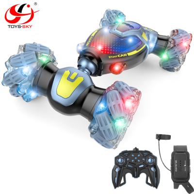 China RC Model High Quality 2.4G Double Side 4X4 RC Stunt Car Kids Radio Control Toys Watch Hand Motion Gesture Sensor Car With Music And Light for sale