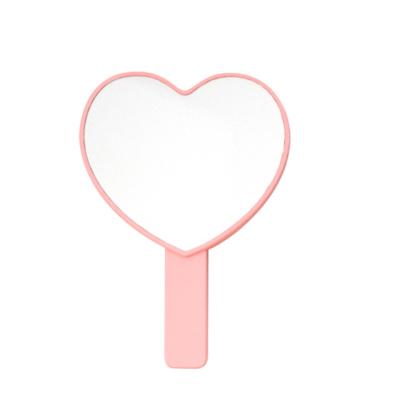 China Wholesale Custom Beautiful Custom Personalized Pink Portable Heart Shaped Hand Shaped Hand Held Makeup Compact Mirror for sale