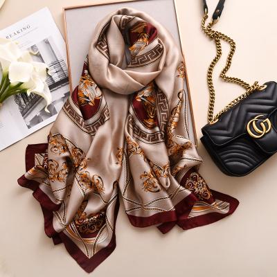 China Hot Selling Famous Designer Silk Scarves Long Large Designer Ladies Fashion Soft Soft Feeling Silk Printed Head Scarf Luxury Muslim Women Shawls for sale