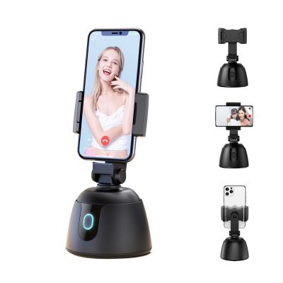 China Face Tracking Wholesale Smart Automatic 360 Degree Tracking Face Follow Gimbal Phone Holder Selfie Shooting Stick for sale