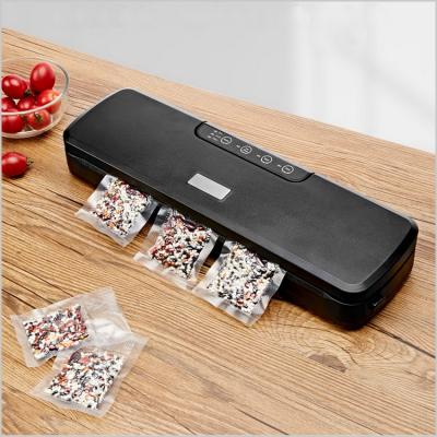 China Hot Selling Household Food Vacuum Sealer With 10 Pcs Vacuum Bags for sale