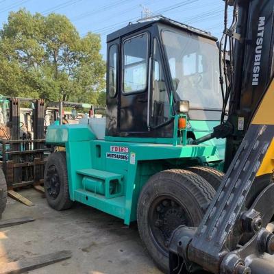 China Mitsubshi usado Fd120 12 Ton Diesel Forklift con el cambio lateral y la bifurcación larga en venta