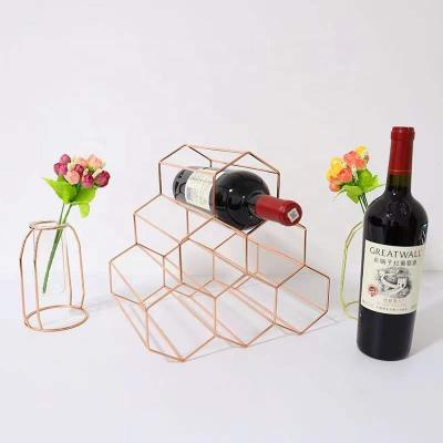 China Simple modern diamond-shaped removable cover iron wire rose wine rack bar wine cabinet gold creative decoration for sale