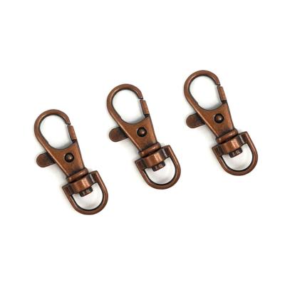 China Environmentally Friendly And Durable New Dog Clothing Buckle Bag Hardware Accessories Bronze Round Buckle Dog Accessories for sale