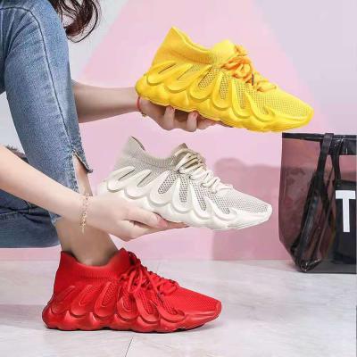 China Fashion Trend Girls Breathable Simple Net Lightweight Fly Knit Women Casual Sneakers for sale