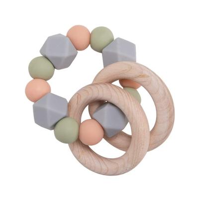 China Hot Selling Soft Toy Baby Beech Chews Silicone Baby Teether StickdiyBracelet Bite Soothing Environmental Teether for sale