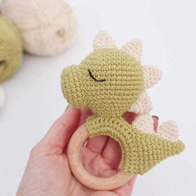 China Wooden Rattle Ring TeetherCrochet Teether Ring Toy Dinosaur Wooden Rattle Set Inflatable Custom Wooden Baby Tether Set for Newborn Baby for sale