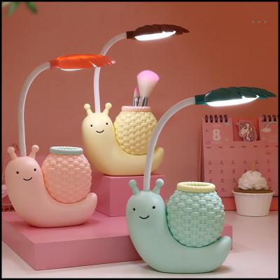 China Cute Flash Color Fun Snail Desk Lamp Pen Holder Led Students And Kids Reading And Learning Small Desk Lamp USB Night Fill Lamp for sale