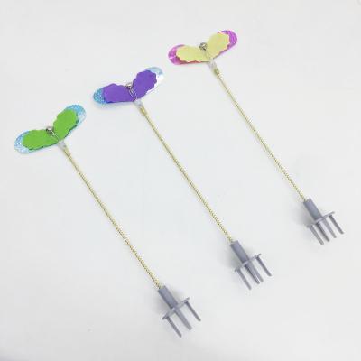 China Teasing Cat Stocked New Cute Wind Butterfly With Kitten Gold Spring Self-entertainment Cat Swinging Toys Wholesale for sale