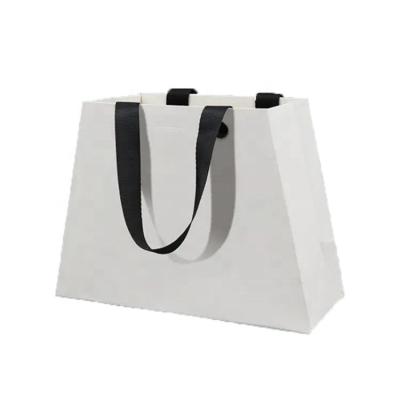 China Recyclable Luxury Colorful Fabric Makeup Handled Shop Bags With Logo Merchandise Bags Packaging Bag for sale