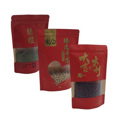 China Recyclable Kraft Paper Zip Lock Bags Nut Food Packaging Bag Stand Up Pouch With Rectangular Window à venda