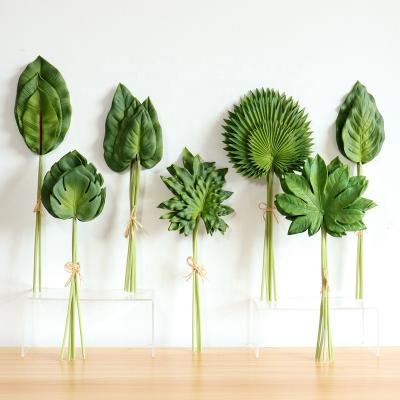 China Artificial Richicgarde Bnana PU Palm Leaf Monstera Pampas Spring Leaves For Table Centerpieces Artificial Plants for sale