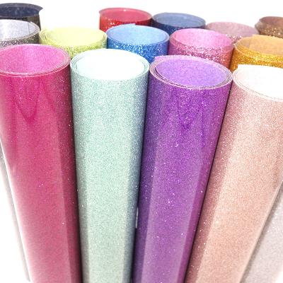 China Cup 16 Colors Heat Transfer Glitter Vinyl Iron On For Clothes HTV Shirt Decor Elastic Film The Top Easy To Cut for sale