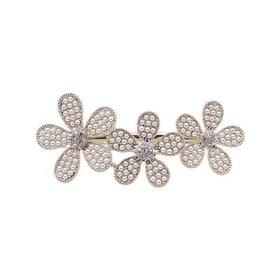 China Fashionable and simple pearldiamond-framed sense of design clip temperament pin hair flower jewelry decoration for sale