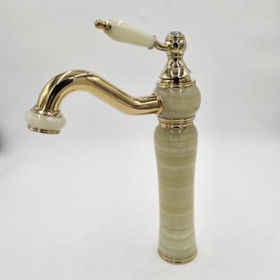 China Luxury Gold Brass Faucets Jade Basin Faucet For Bathroom Metered Single Hole Faucet for sale