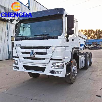 China 6X4 Used Truck Tractor Trailer Used Tractors Trucks 2015 Used Howo Truck Tractors 6.9x2.5x3.1 for sale