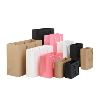 China Recycled Materials Party Wholesale Cheap Printed Brown Luxury Custom Paper Shopping Bags Recyclable Designer Art Kraft Paper With Handle for sale