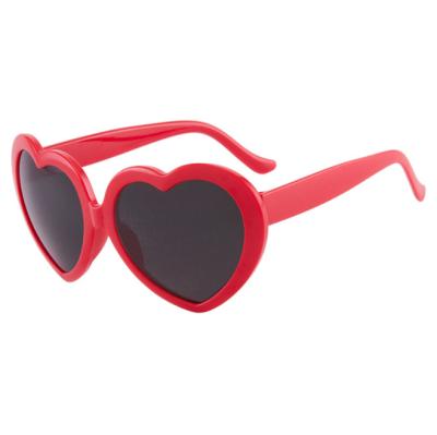 China Women's sunglasses lights turn red with love glass night romantic net vibrato with the same style sunglasses tide peach heart sunglasses female tide for sale