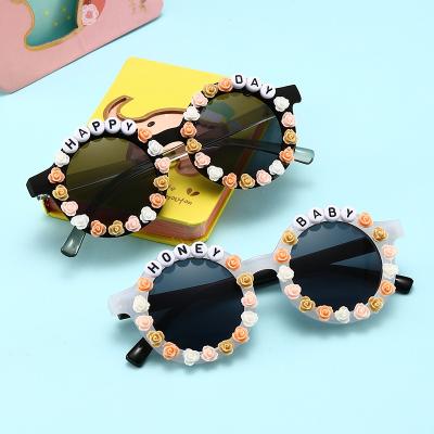 China Wholesa Fashion Street Shooting Sunglasses UV Protection Flower Alphabet Sticky Sunglasses New Fashion Sunglasses Children's Sunglasses for sale